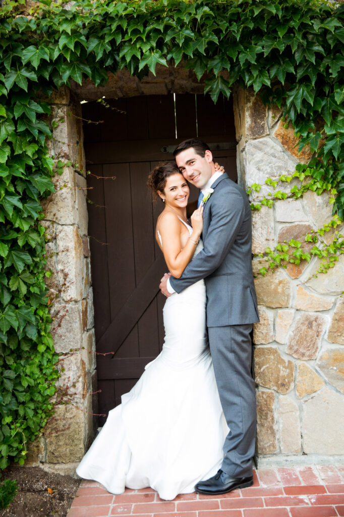 couple standing in entry door