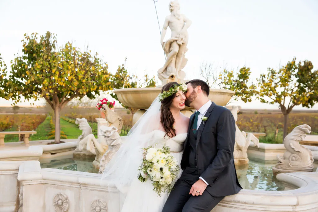 bride and groom at jacuzzi fountain