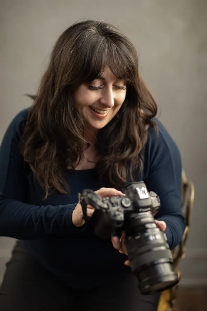 photo of photographer holding camera